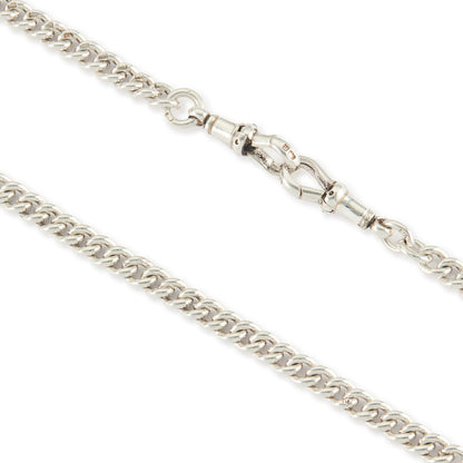 Classic Edwardian Sterling silver curb link fob chain with two dog-clips and a T-bar. There is a piece of chain attached allowing the chain to be lengthened or to attach a medallion or fob. Every link is stamped.