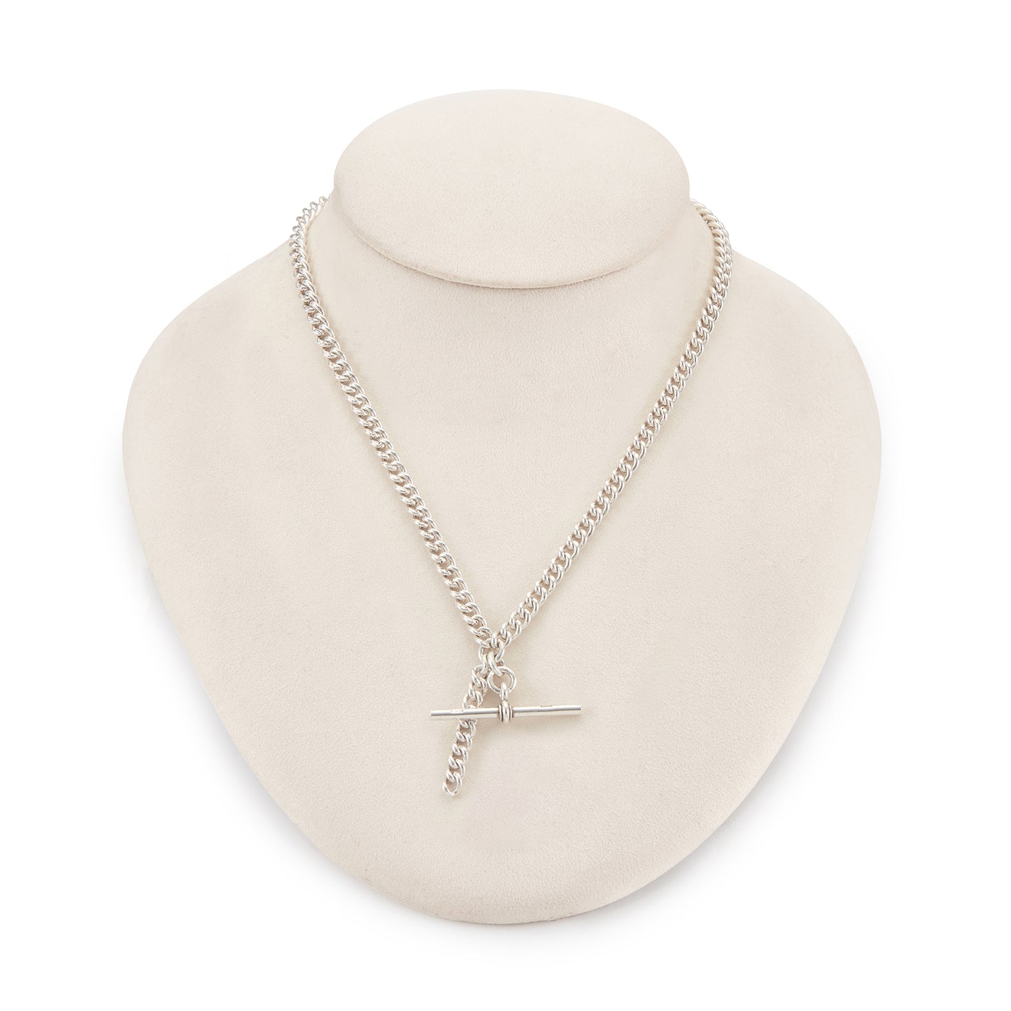 Classic Edwardian Sterling silver curb link fob chain with two dog-clips and a T-bar. There is a piece of chain attached allowing the chain to be lengthened or to attach a medallion or fob. Every link is stamped.