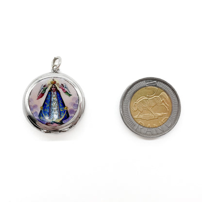 Charming silver enamelled locket depicting Madonna being crowned by two angels.