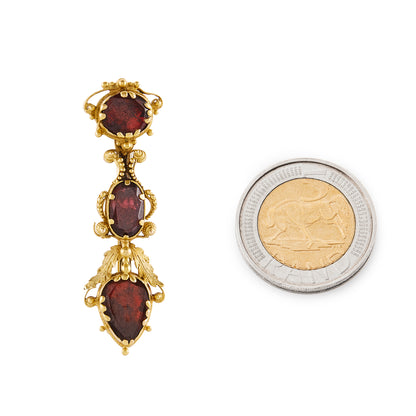 Exquisite 18ct yellow gold Georgian brooch, with three beautiful deep red garnets set in an intricate cannetille work mount.