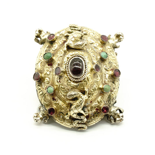 Very unusual Austro-Hungarian tortoise shaped gilt buckle set with garnets and turquoise stones. Adorned with two climbing lizards and beautiful engraving. This piece would look beautiful on a velvet choker.
