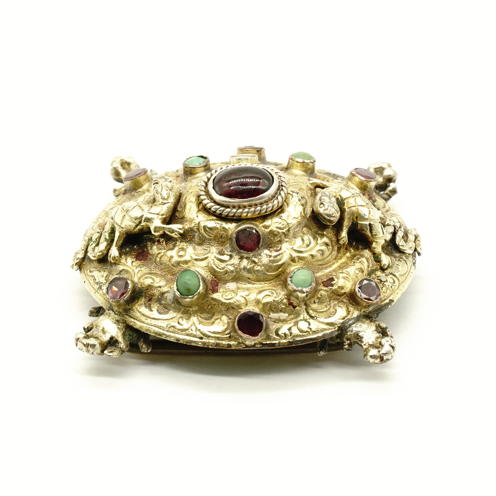 Very unusual Austro-Hungarian tortoise shaped gilt buckle set with garnets and turquoise stones. Adorned with two climbing lizards and beautiful engraving. This piece would look beautiful on a velvet choker.