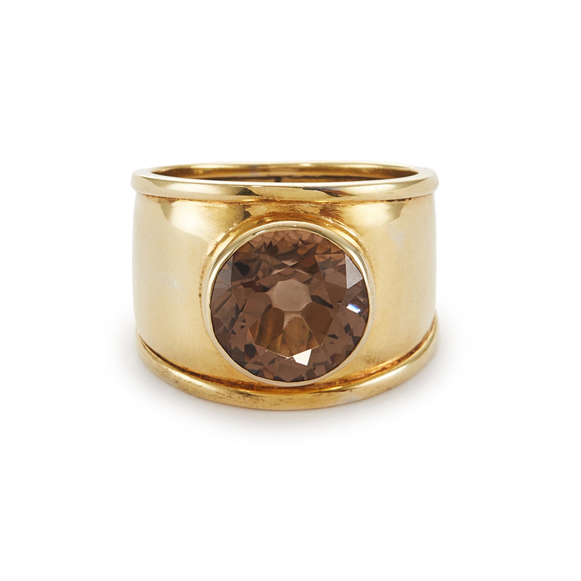 Classic gold plated on silver ring with a beautifully faceted smoky quartz in a tube setting.