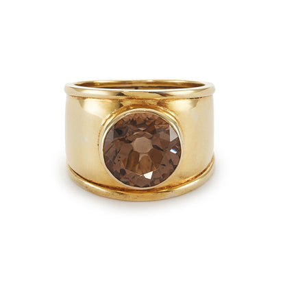 Classic gold plated on silver ring with a beautifully faceted smoky quartz in a tube setting.