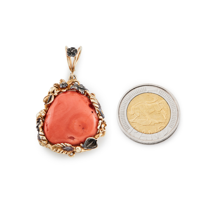 Stunning vintage natural coral pendant, set in an ornate, gold plated on silver floral setting. Some oxidation. Italy