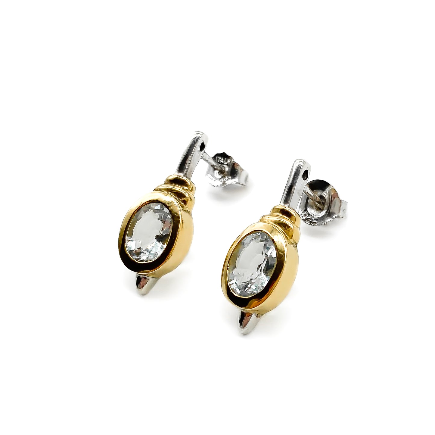 Classic gold on sterling silver drop earrings with tube set oval faceted aquamarine stones.