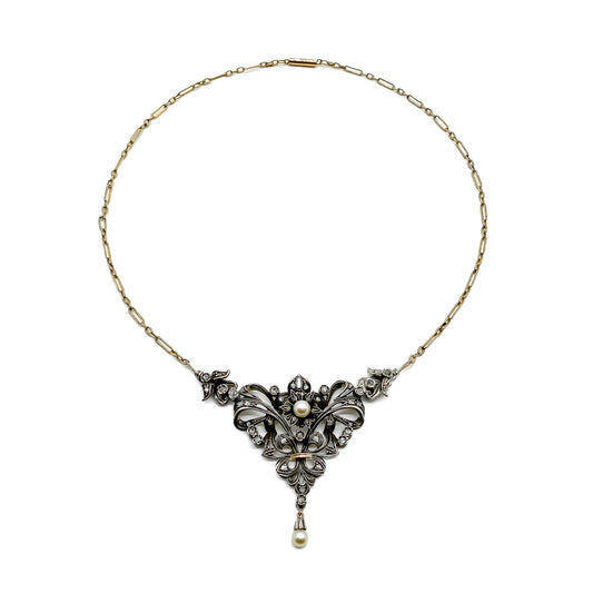Gorgeous Edwardian gold and silver necklace set with old-cut diamonds and two pearls. Circa 1910