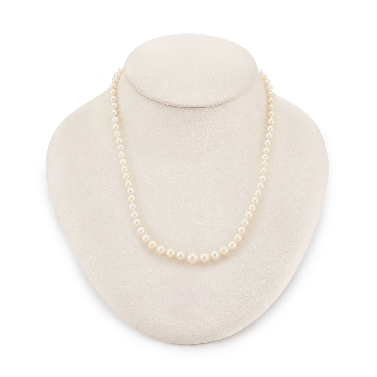 Lovely graduated seawater pearl necklace with a sterling silver and pearl clasp. The pearls have a creamy hue and a very good lustre.