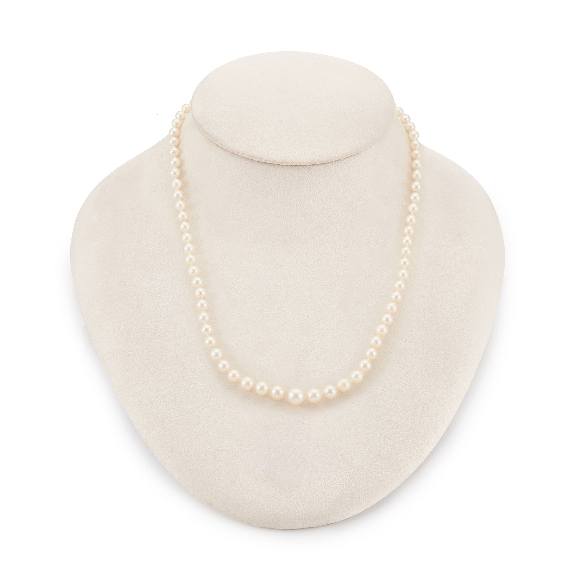 Lovely graduated seawater pearl necklace with a sterling silver and pearl clasp. The pearls have a creamy hue and a very good lustre.