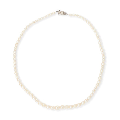 Lovely graduated seawater pearl necklace with a sterling silver and pearl clasp. The pearls have a creamy hue and a very good lustre.