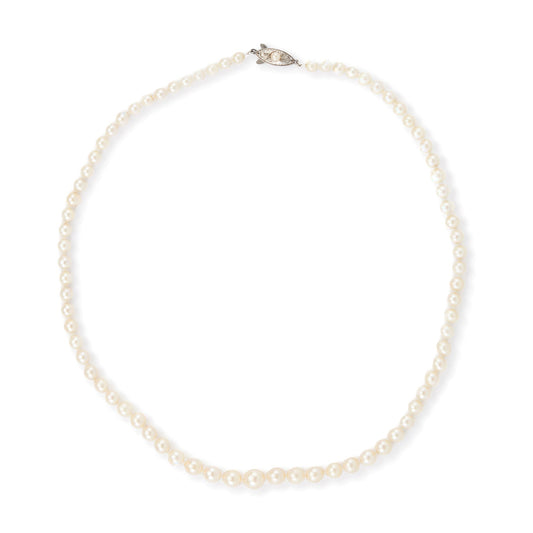 Lovely graduated seawater pearl necklace with a sterling silver and pearl clasp. The pearls have a creamy hue and a very good lustre.