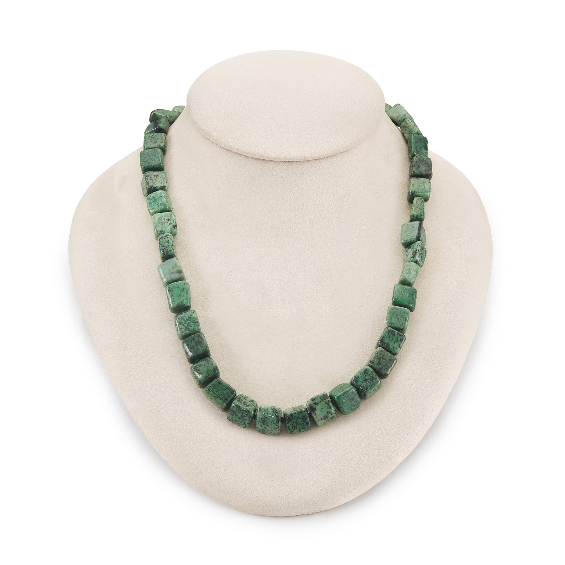 Very unusual, irregular natural hydroglossular vintage string of garnet beads with a variation of beautiful green hues and a sterling silver clasp.