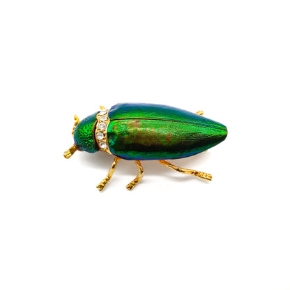 Stunning brooch made from a real iridescent green jewel beetle and added pastes in a gilt setting. 