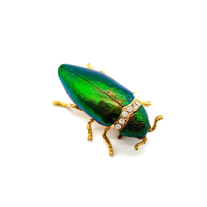 Stunning brooch made from a real iridescent green jewel beetle and added pastes in a gilt setting. 