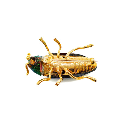 Stunning brooch made from a real iridescent green jewel beetle and added pastes in a gilt setting. 