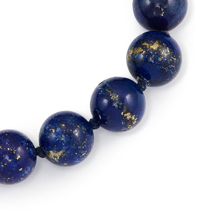 Stylish vintage lapis lazuli bead bracelet with a 9ct rose gold bolt ring clasp. Exceptional quality lapis lazuli beads with many golden flecks.