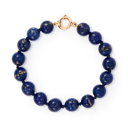 Stylish vintage lapis lazuli bead bracelet with a 9ct rose gold bolt ring clasp. Exceptional quality lapis lazuli beads with many golden flecks.