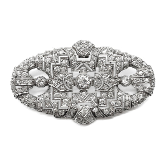 Stunning large platinum Art Deco brooch set with an 0.60ct centre diamond and 132 smaller diamonds. Circa 1920’s Comes with a valuation certificate.