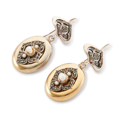 Glamorous vintage gold-plated silver earrings, each set with pastes and three pearls. The earrings make a beautiful statement!