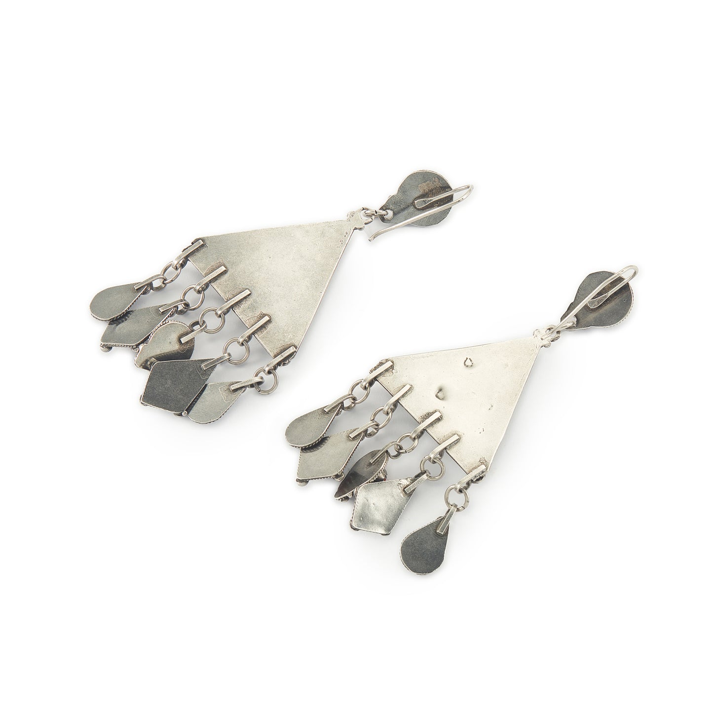 Magnificent ethnic oxidised silver chandelier earrings set with deep red coral cabochons. These large statement earrings are beautifully embossed. 