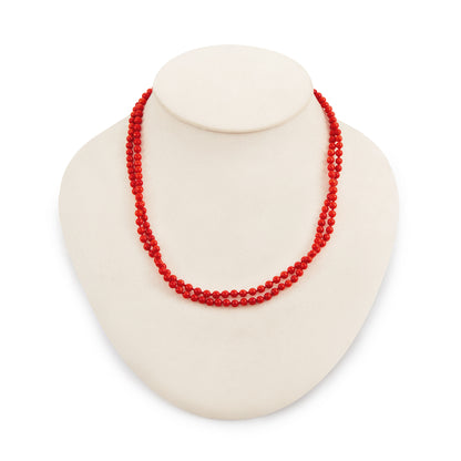 Classic long vibrant red Mediterranean coral necklace with a 9ct gold bolt ring clasp. The necklace can be draped around the neck twice.