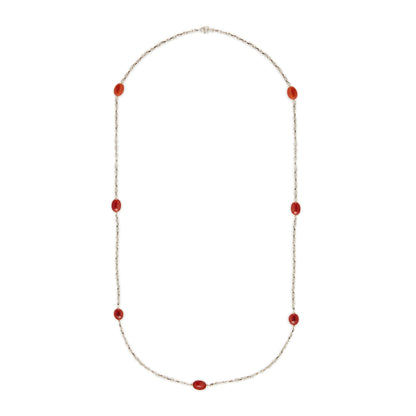 Elegant sterling silver fancy link chain interspersed with seven carnelian stones. Long enough to drape around the neck twice.