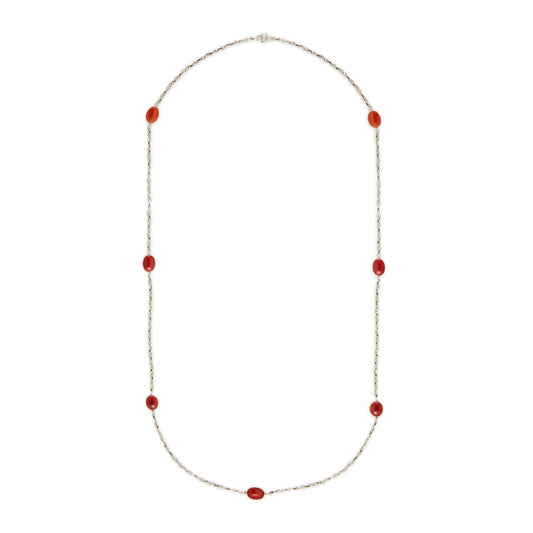 Elegant sterling silver fancy link chain interspersed with seven carnelian stones. Long enough to drape around the neck twice.