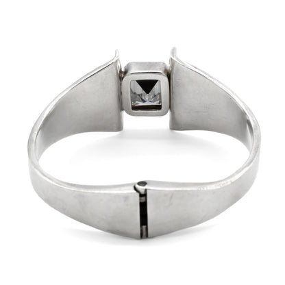 Stunning sterling silver Mexican modernist clamper bangle set with a rectangular rock crystal. Signed Mino’s. Post 1979 