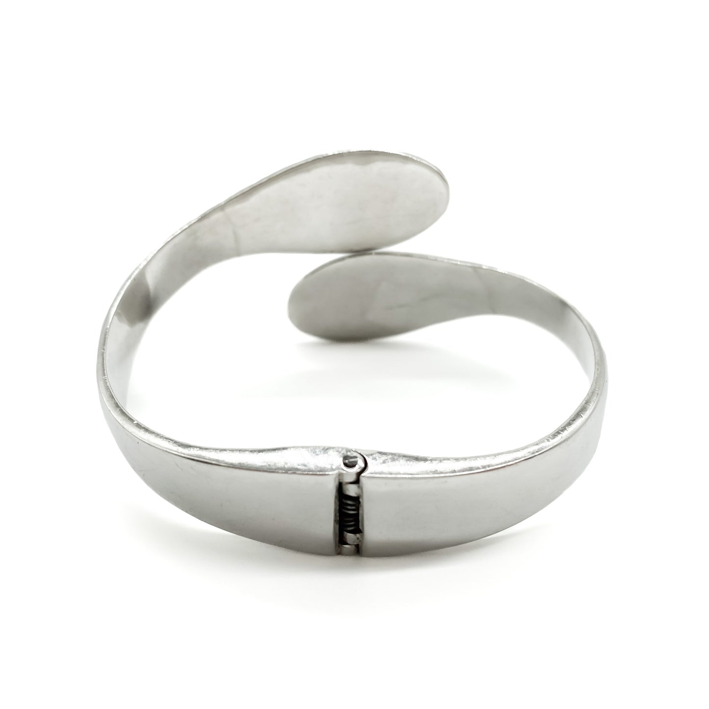 Classic sterling silver Mexican clamper bangle with two faceted onyx stones.