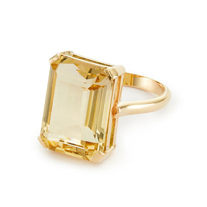 Stylish 9ct gold Mid-Century ring set with a beautifully faceted, emerald-cut citrine in a four claw setting.