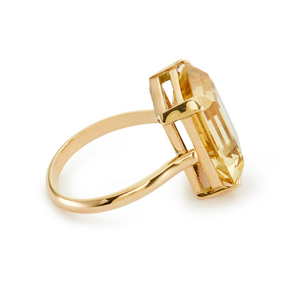 Stylish 9ct gold Mid-Century ring set with a beautifully faceted, emerald-cut citrine in a four claw setting.