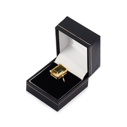 Stylish 9ct gold Mid-Century ring set with a beautifully faceted, emerald-cut citrine in a four claw setting.