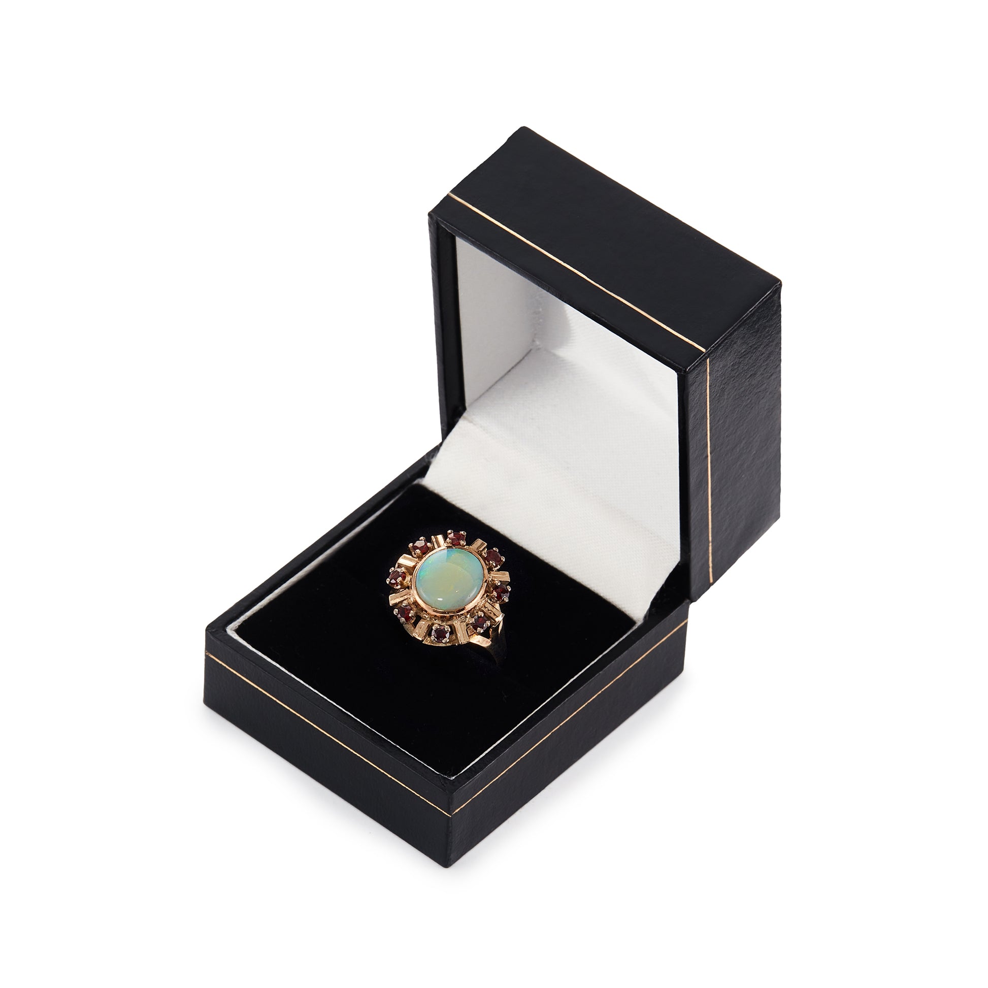 Stunning Mid-century 9ct rose gold ring set with a luminescent oval opal cabochon, surrounded by eight faceted garnets.