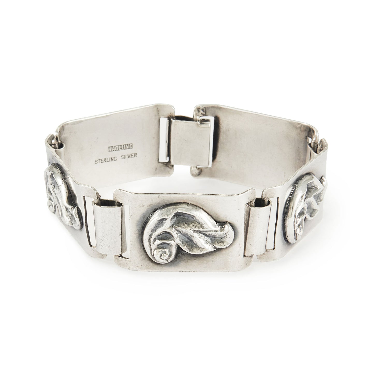 Stylish sterling silver Modernist, Mid-Century panel bracelet with a repoussé design. 
Designer: Haglund (South Africa)