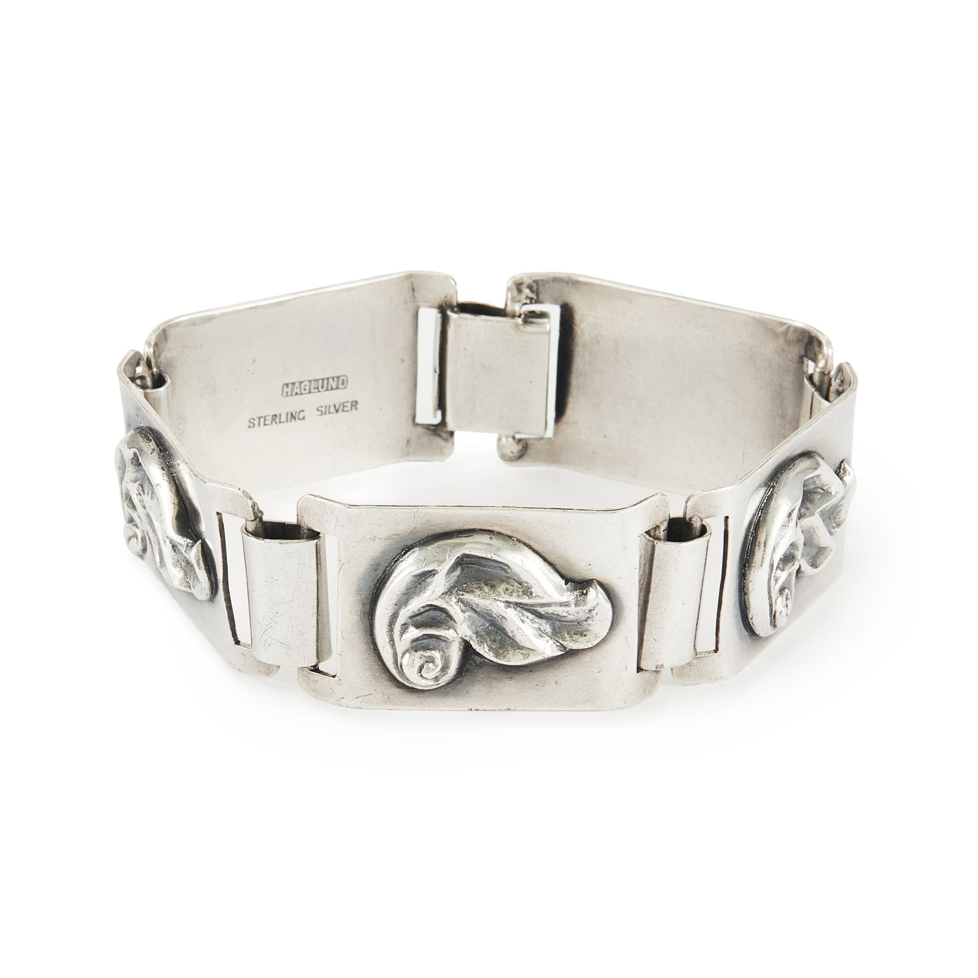 Stylish sterling silver Modernist, Mid-Century panel bracelet with a repoussé design. 
Designer: Haglund (South Africa)