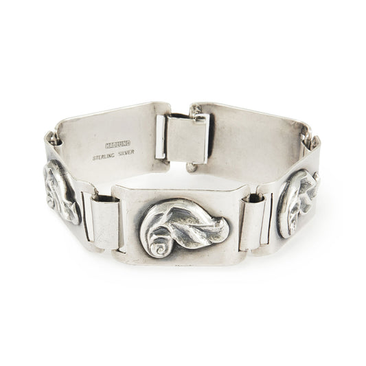 Stylish sterling silver Modernist, Mid-Century panel bracelet with a repoussé design. 
Designer: Haglund (South Africa)