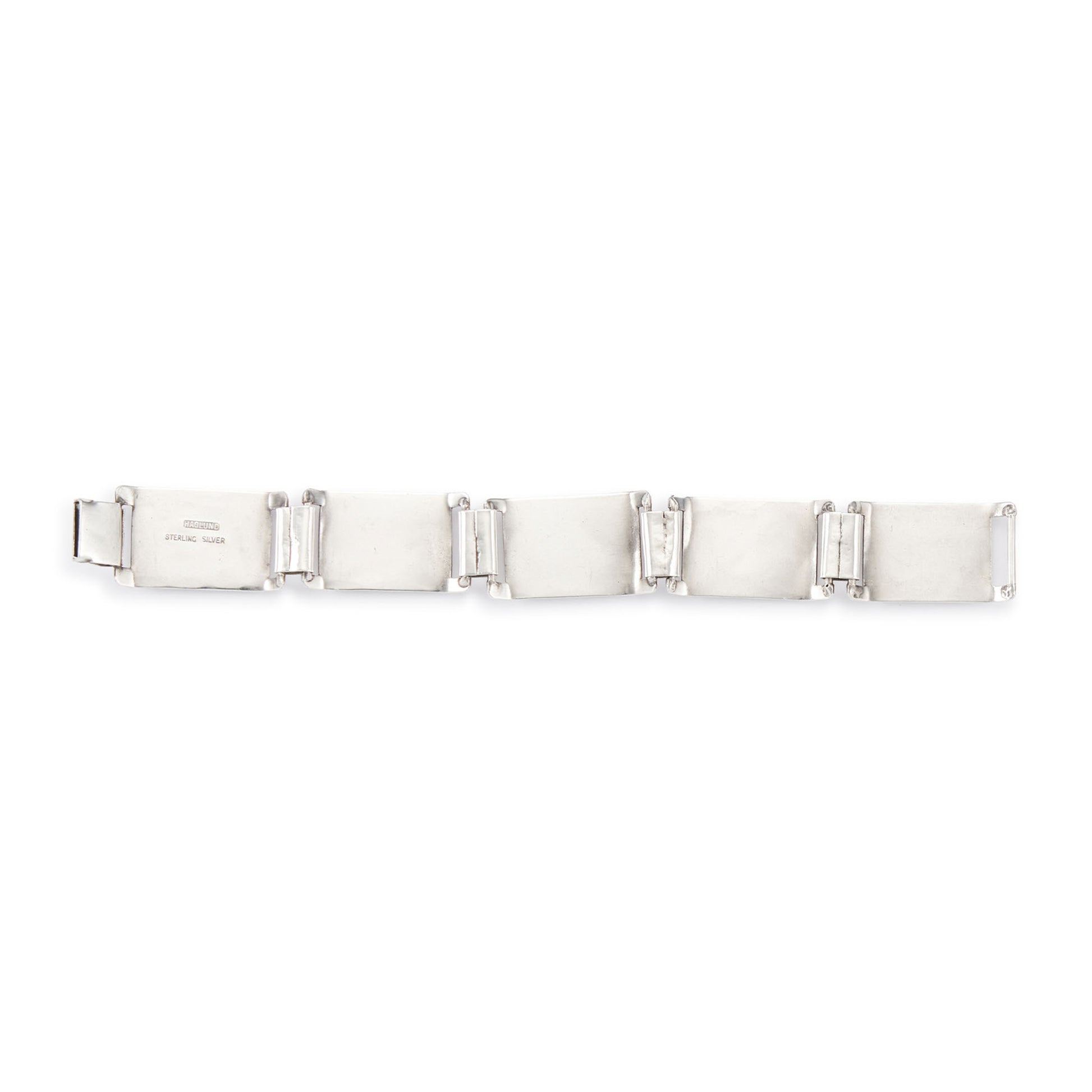 Stylish sterling silver Modernist, Mid-Century panel bracelet with a repoussé design. 
Designer: Haglund (South Africa)