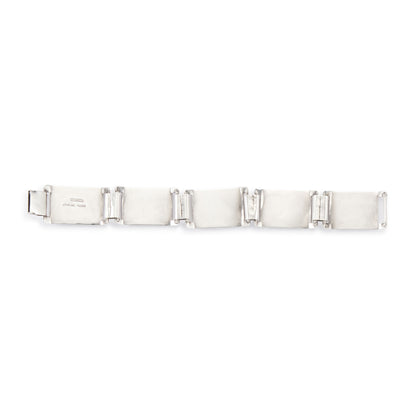 Stylish sterling silver Modernist, Mid-Century panel bracelet with a repoussé design. 
Designer: Haglund (South Africa)