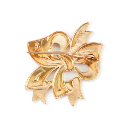 Sought after 9ct gold Candida mid-century bow brooch with maker’s mark.