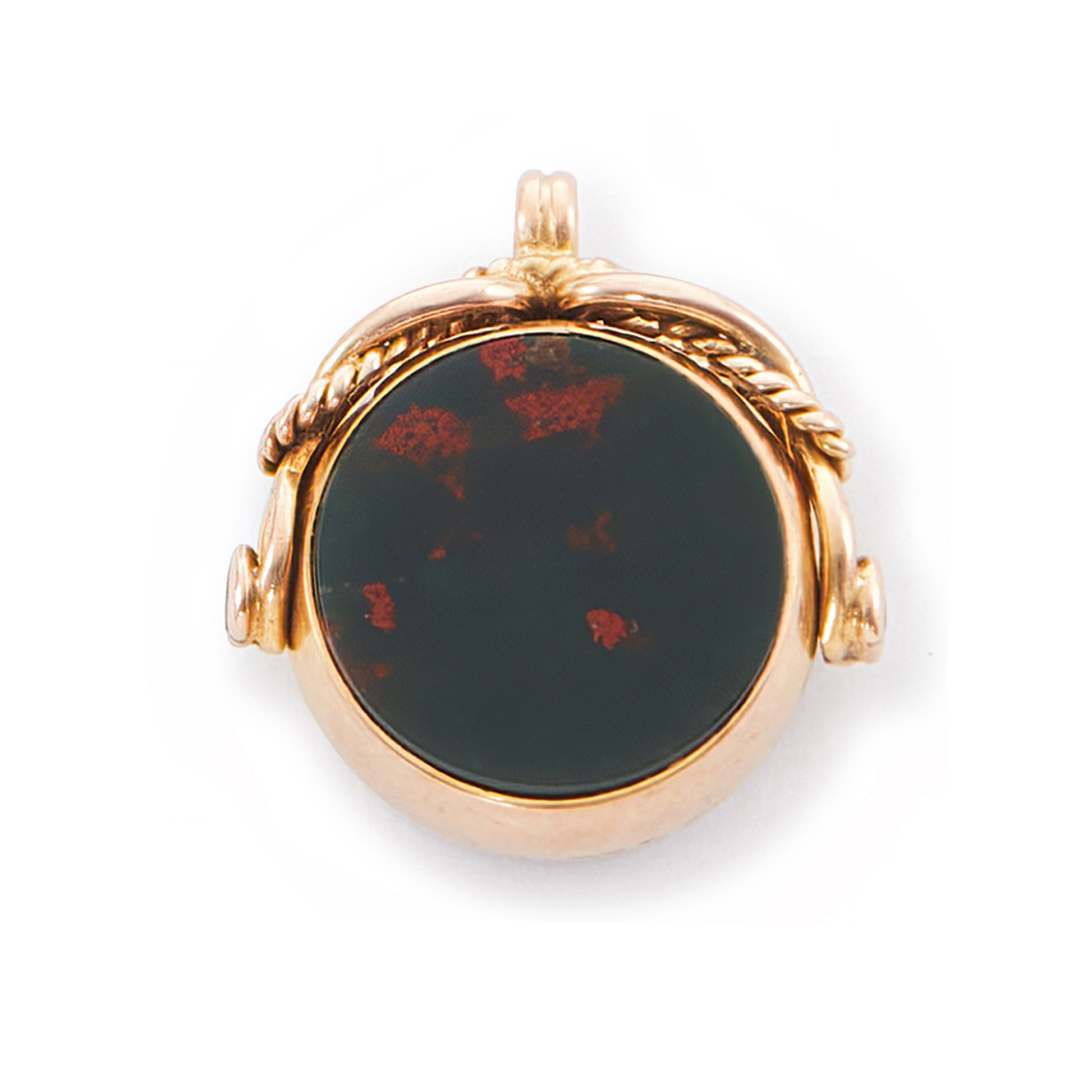 Miniature Victorian 9ct rose gold swivel fob set with a carnelian disc on one side and a bloodstone disc on the other side.