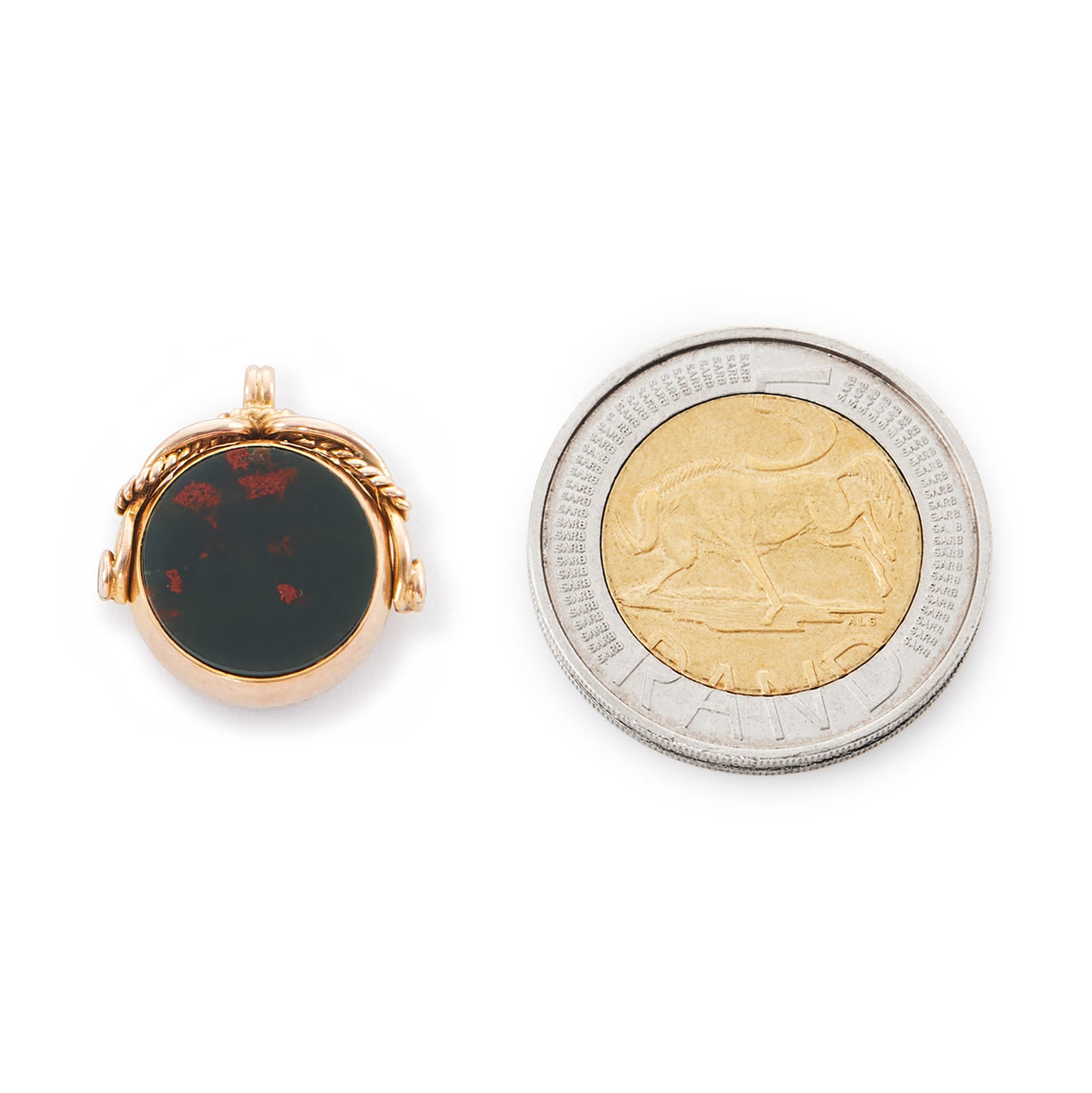 Miniature Victorian 9ct rose gold swivel fob set with a carnelian disc on one side and a bloodstone disc on the other side.