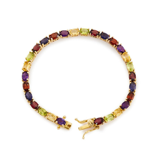 Colourful vintage gold plated tennis bracelet, set with twenty eight beautifully faceted natural garnets, peridots, citrines, amethysts and iolites. Comes with a GemLab ID.