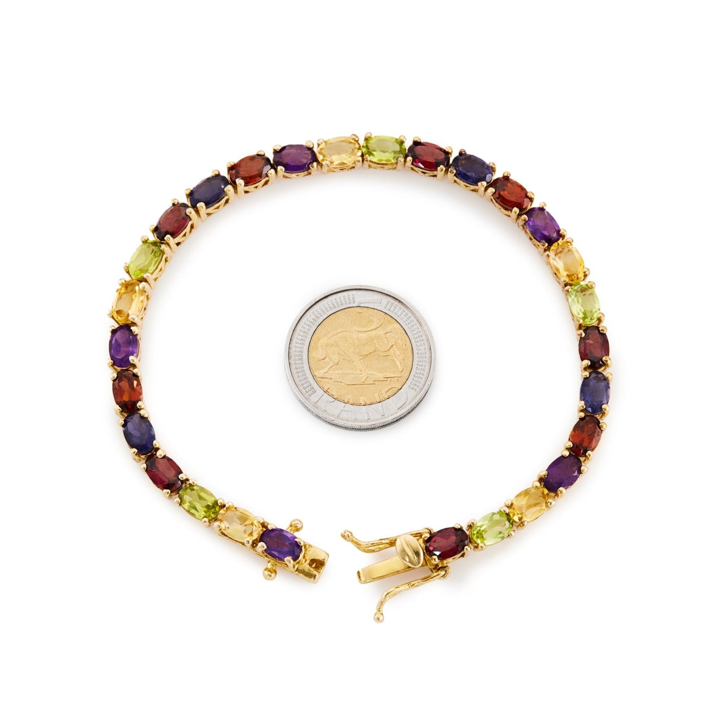 Colourful vintage gold plated tennis bracelet, set with twenty eight beautifully faceted natural garnets, peridots, citrines, amethysts and iolites. Comes with a GemLab ID.