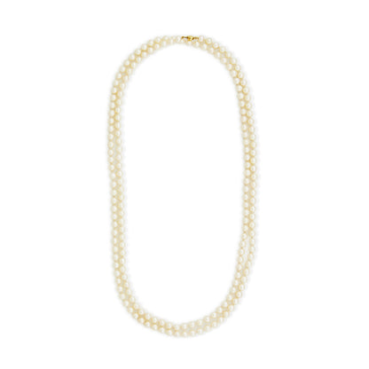 Opera length pearl strand with 6mm lustrous creamy pearls and a 9ct gold clasp. Can be draped around the neck three times.