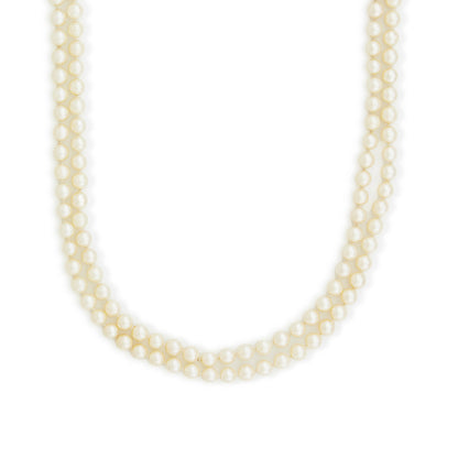 Opera length pearl strand with 6mm lustrous creamy pearls and a 9ct gold clasp. Can be draped around the neck three times.