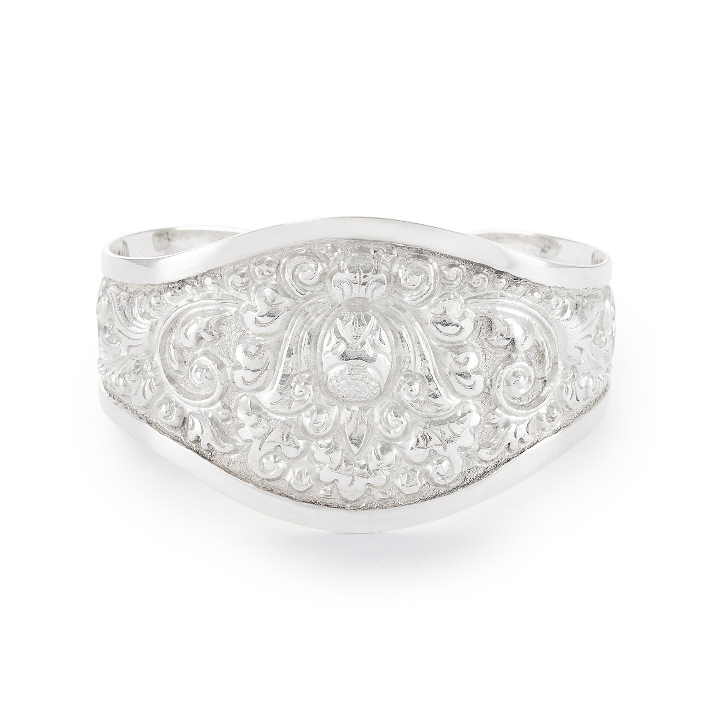 Gorgeous silver repoussé bangle with ornate detail. The bangle is open so the size is adjustable. Circa 1930s