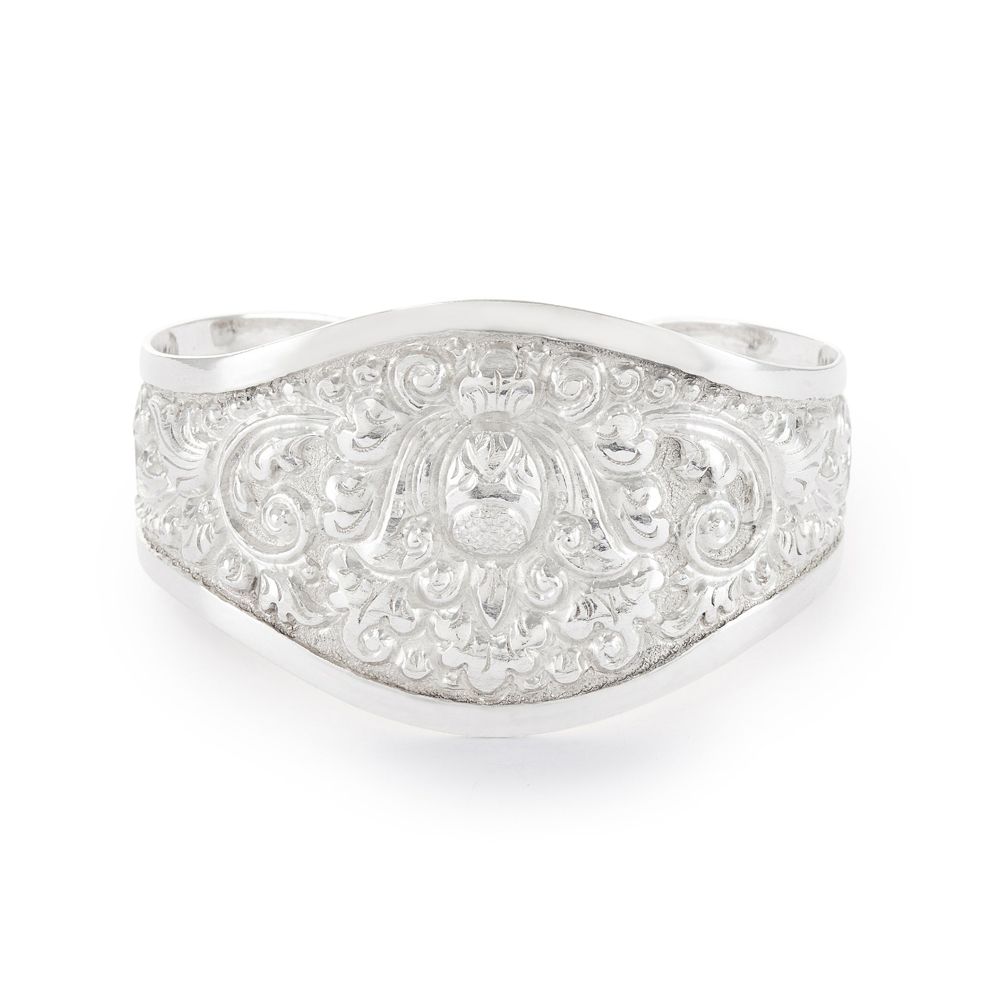 Gorgeous silver repoussé bangle with ornate detail. The bangle is open so the size is adjustable. Circa 1930s