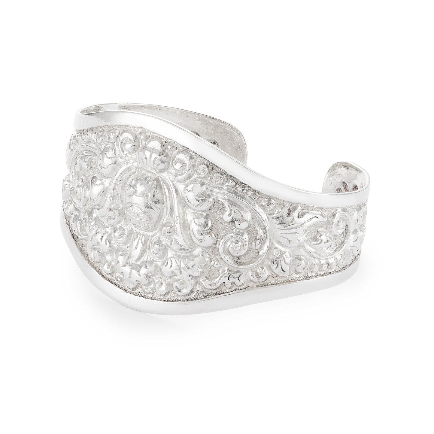 Gorgeous silver repoussé bangle with ornate detail. The bangle is open so the size is adjustable. Circa 1930s