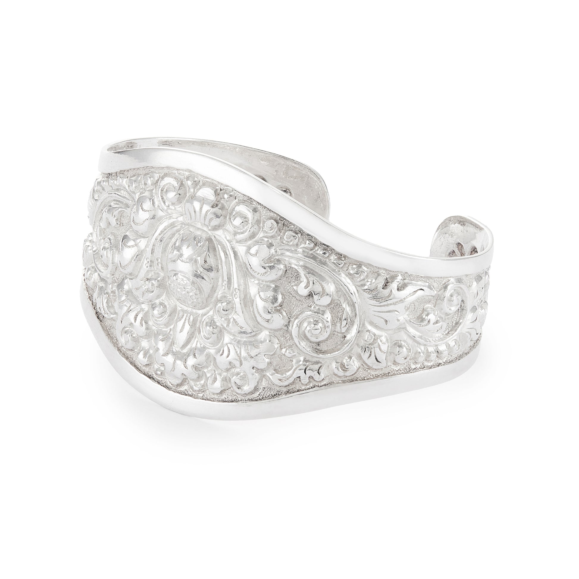 Gorgeous silver repoussé bangle with ornate detail. The bangle is open so the size is adjustable. Circa 1930s