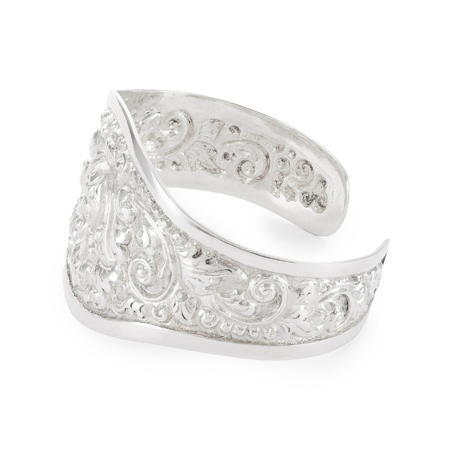 Gorgeous silver repoussé bangle with ornate detail. The bangle is open so the size is adjustable. Circa 1930s